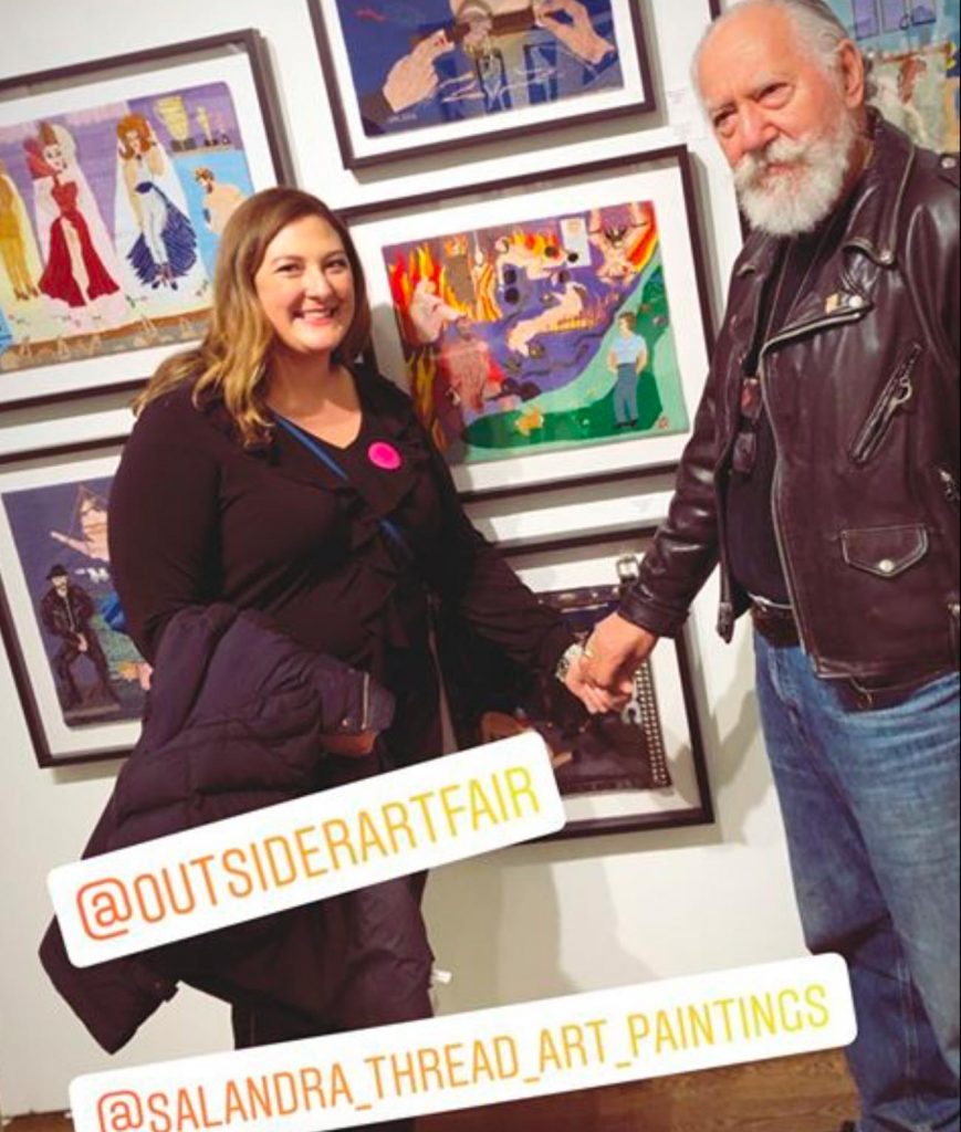 Photo of Sal and fan at art fair